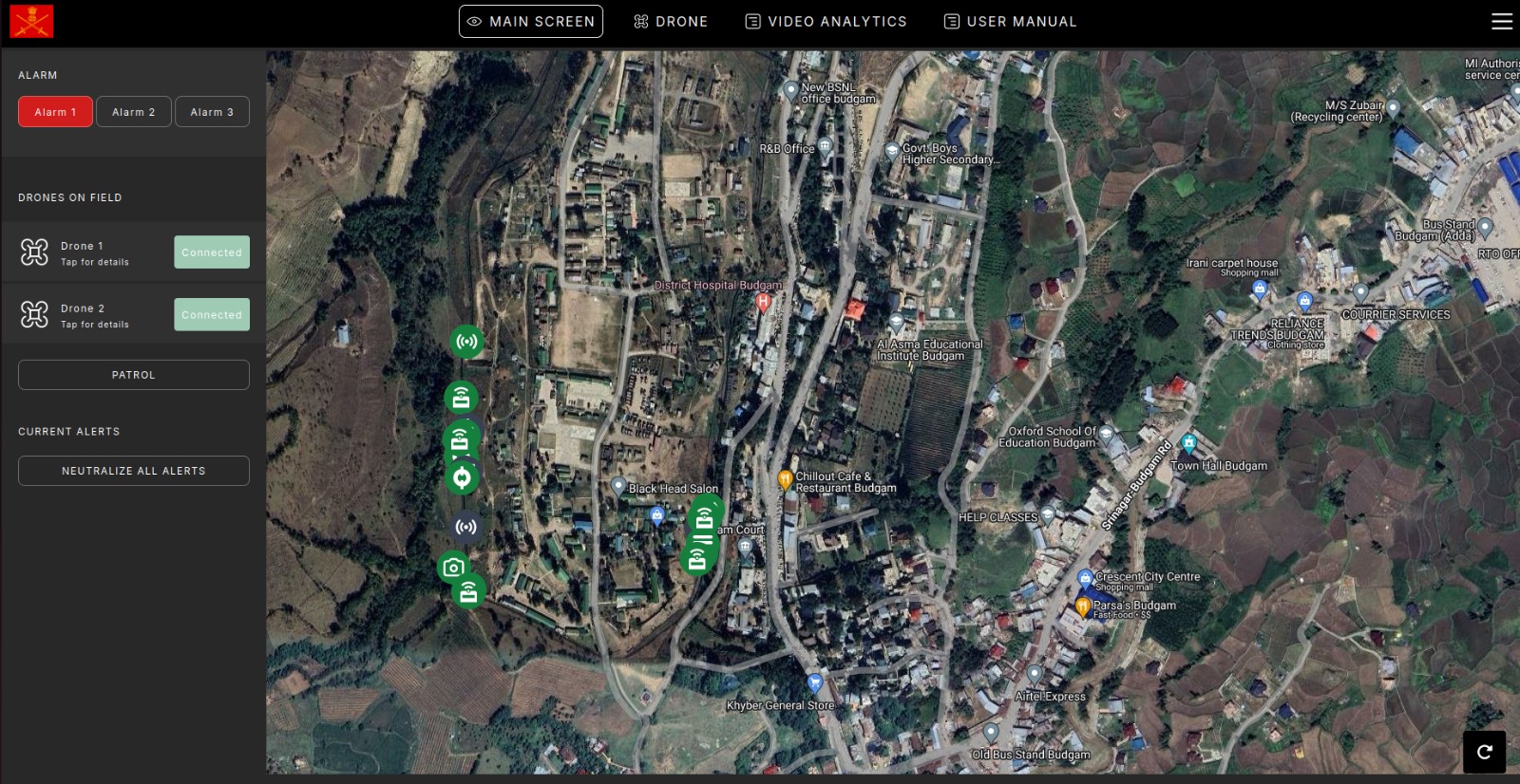 Drone command platform showing field aircraft and alerts on a satellite map